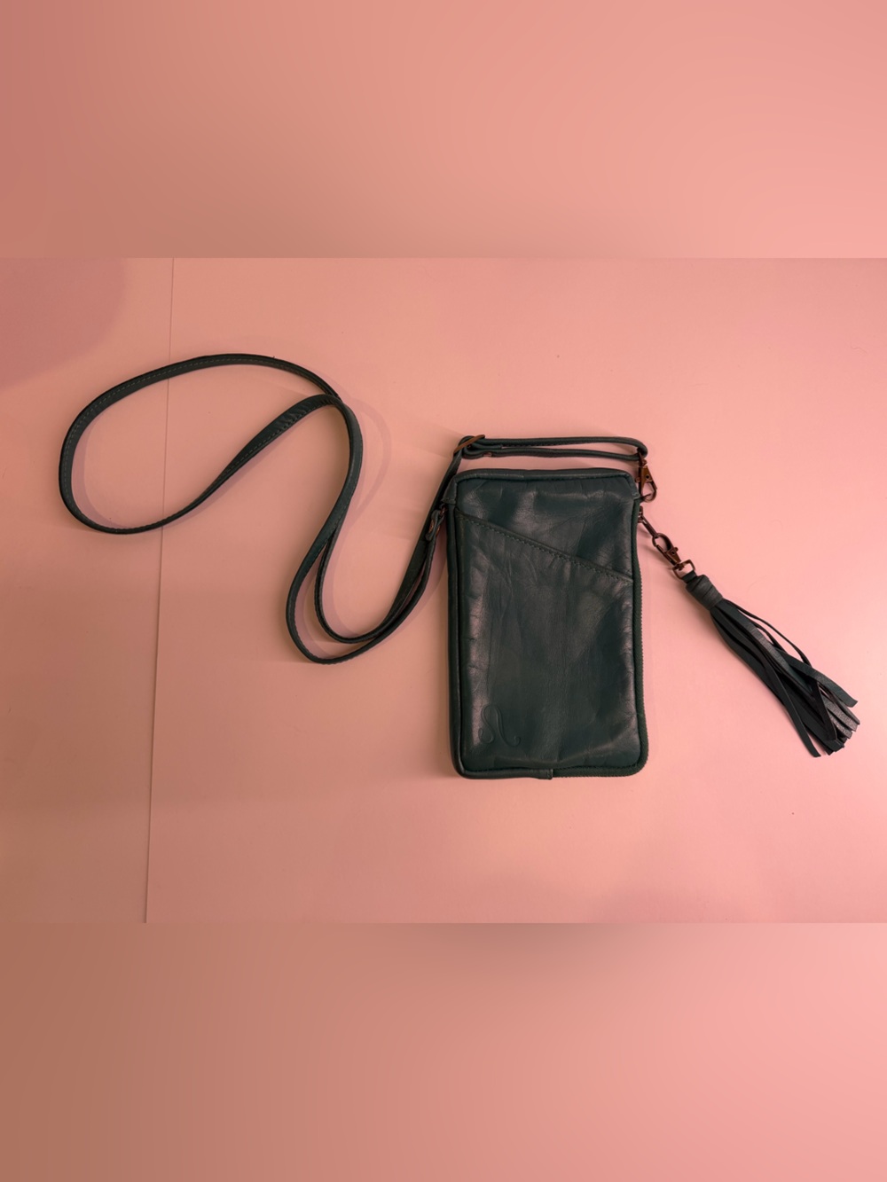 Sleek Dark Green Leather Crossbody with Tassel Accent